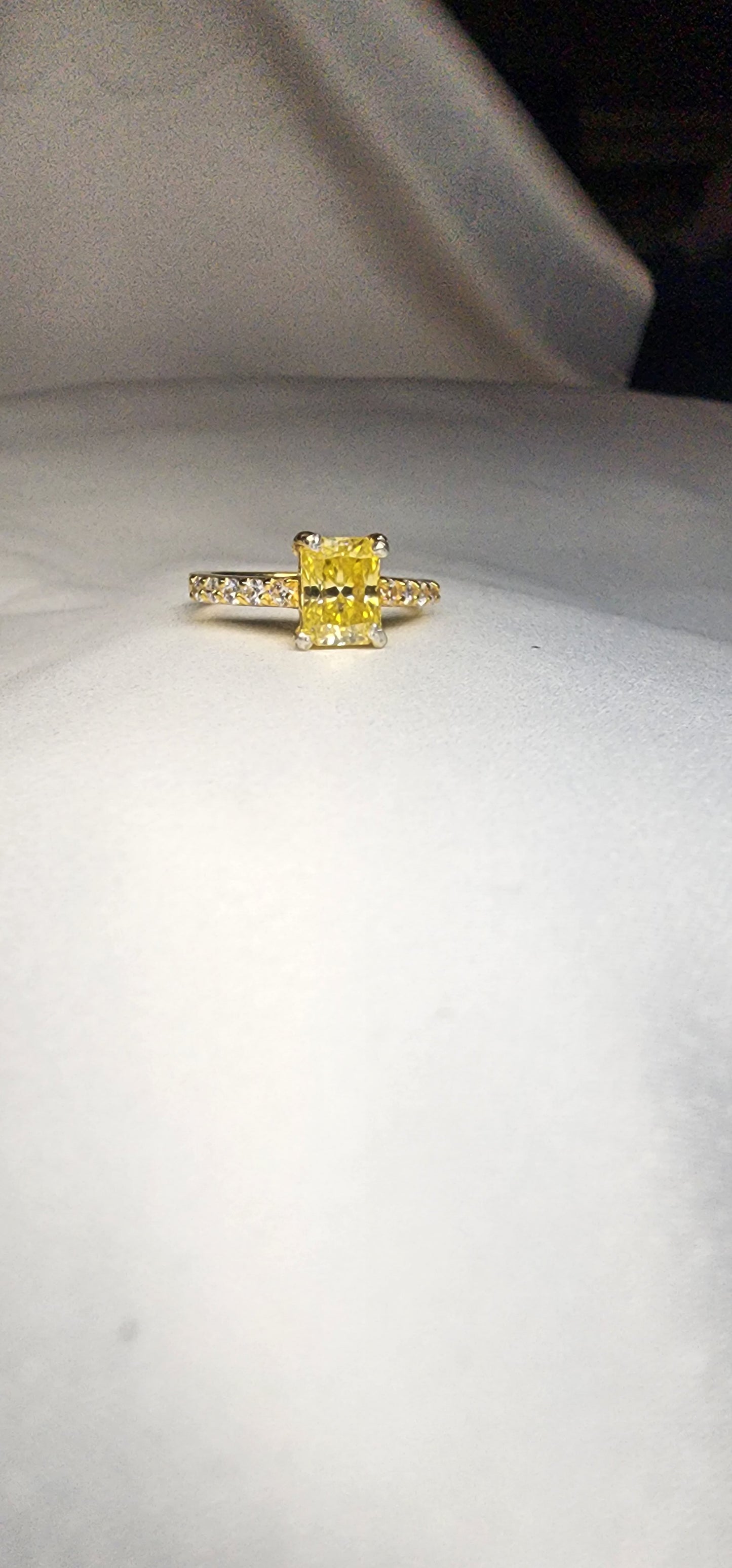 2ct Exquisite Yellow Radiant Cut Moissanite Solitaire Ring. A Timeless Appeal enhanced by moissanite  side stones. GRA Certified, VVS1.