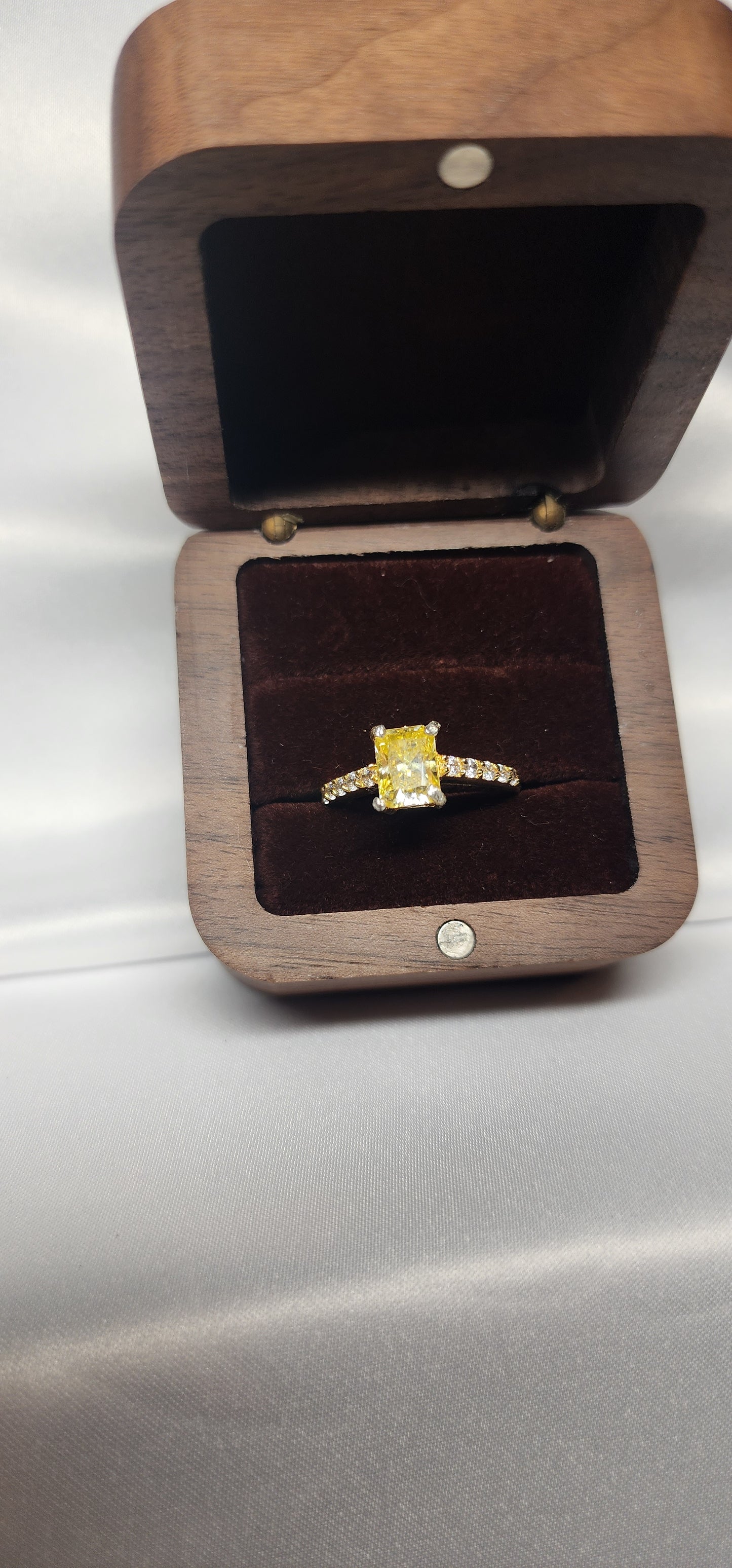 2ct Exquisite Yellow Radiant Cut Moissanite Solitaire Ring. A Timeless Appeal enhanced by moissanite  side stones. GRA Certified, VVS1.